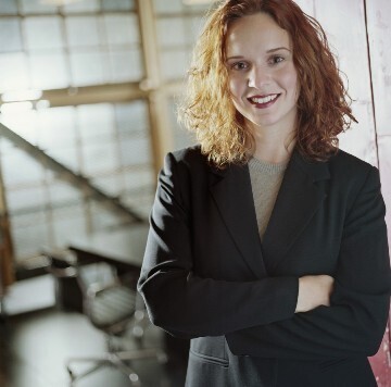 Woman smiling with arms crossed